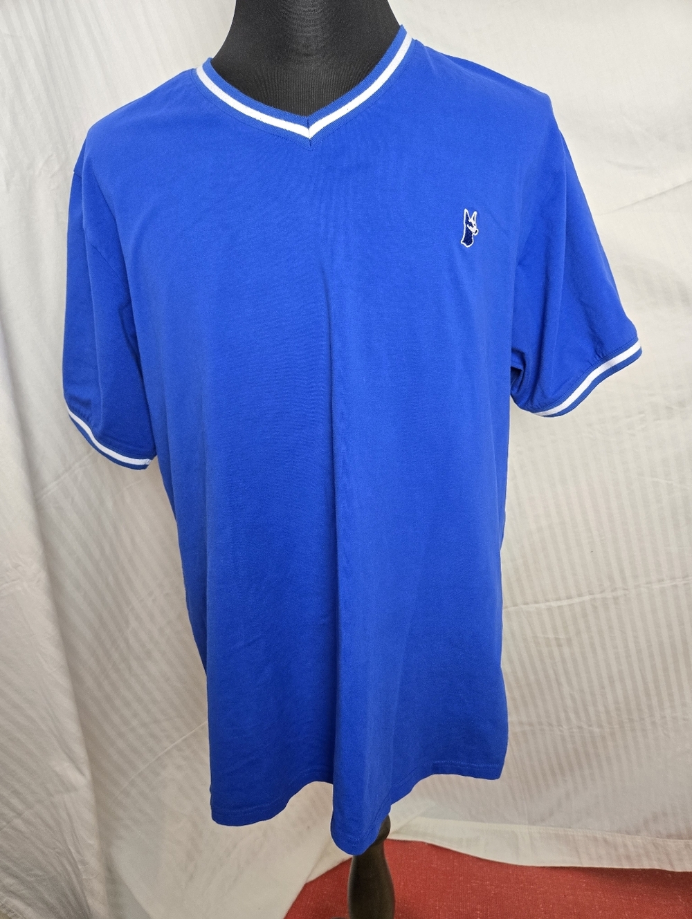 Makobi Royal Blue V-Neck Short Sleeve Tee with White Trim.   TM
